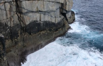 A cliff with breaking turbulent water